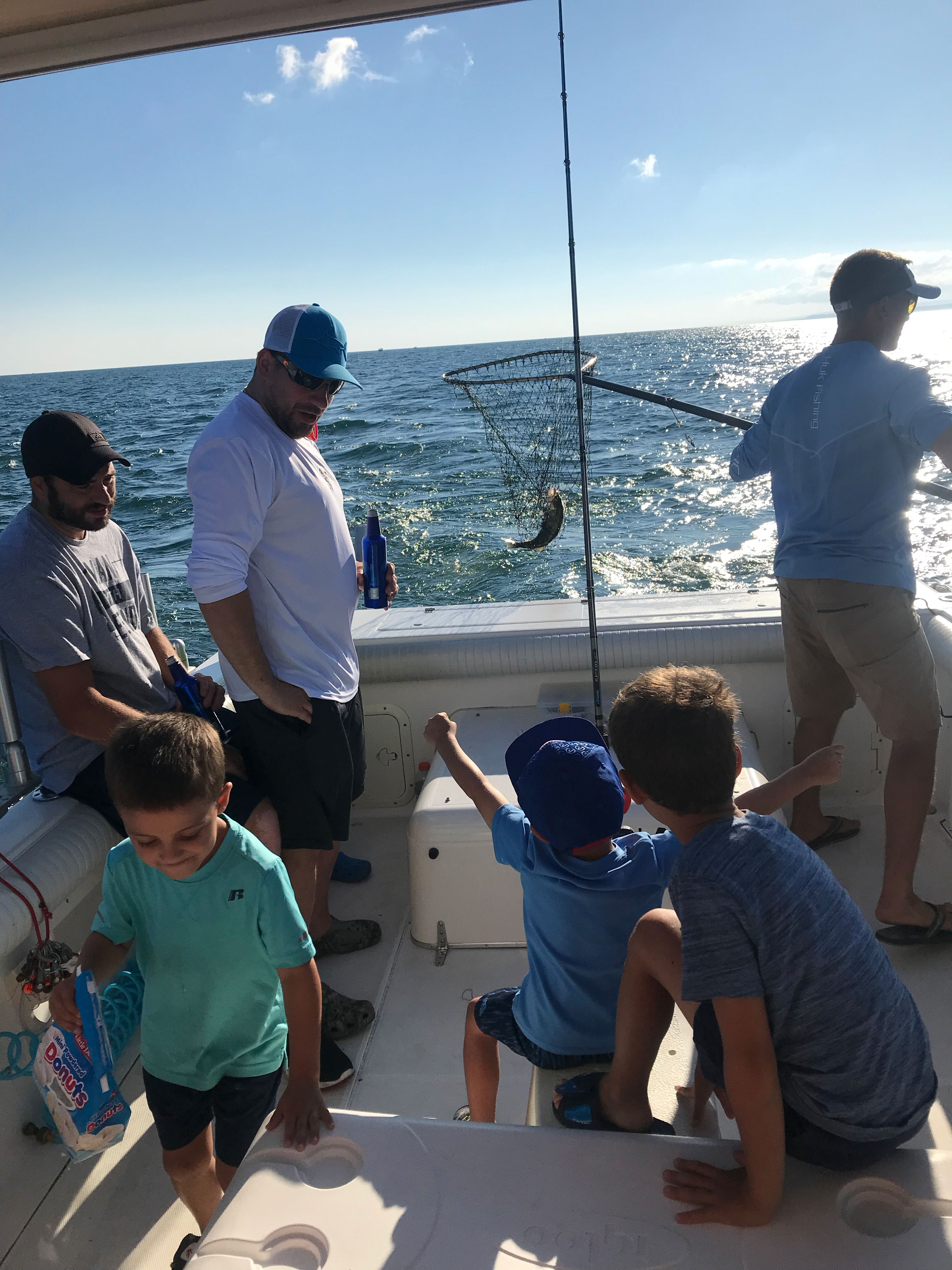 kids excited to catch a fish