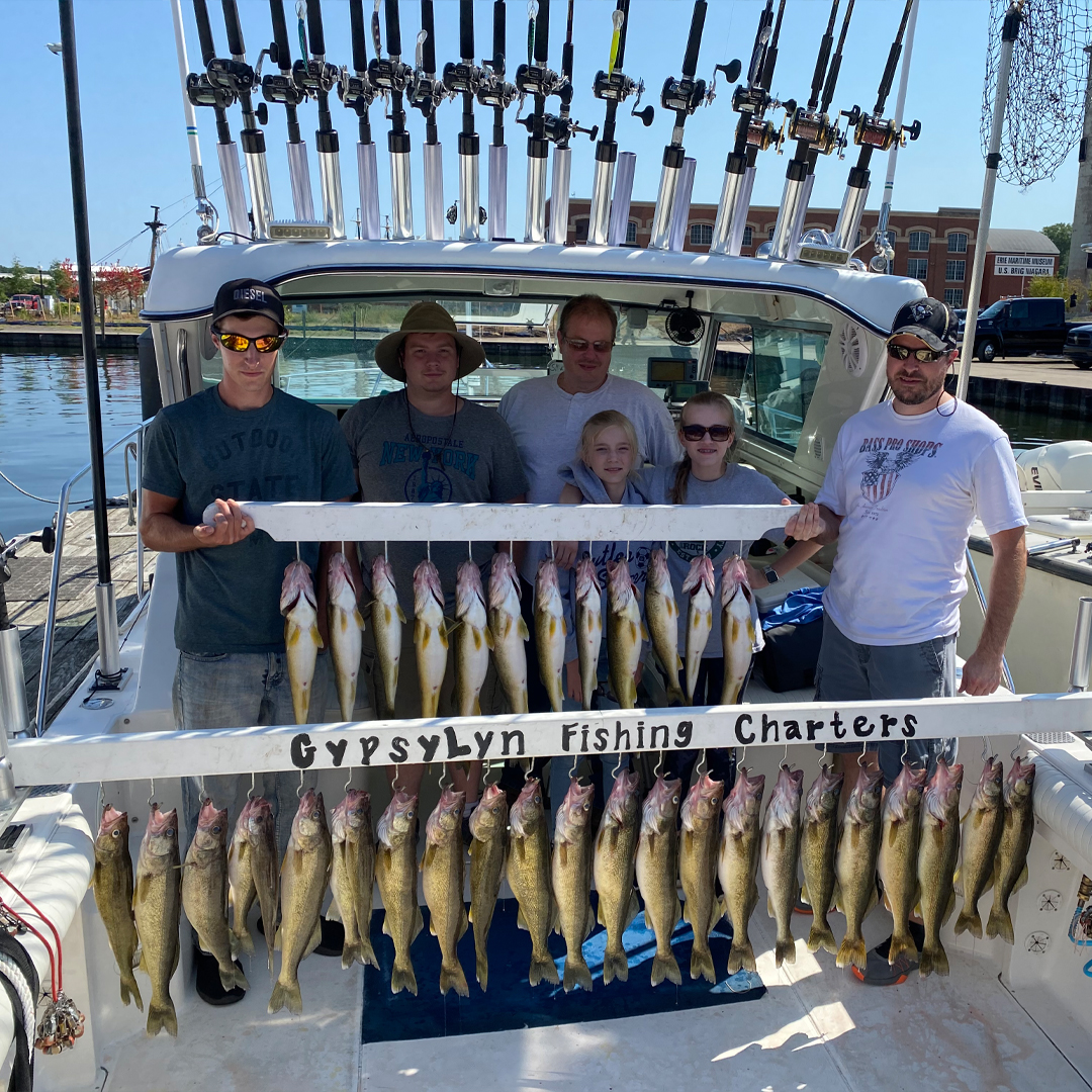 family with walleye catch